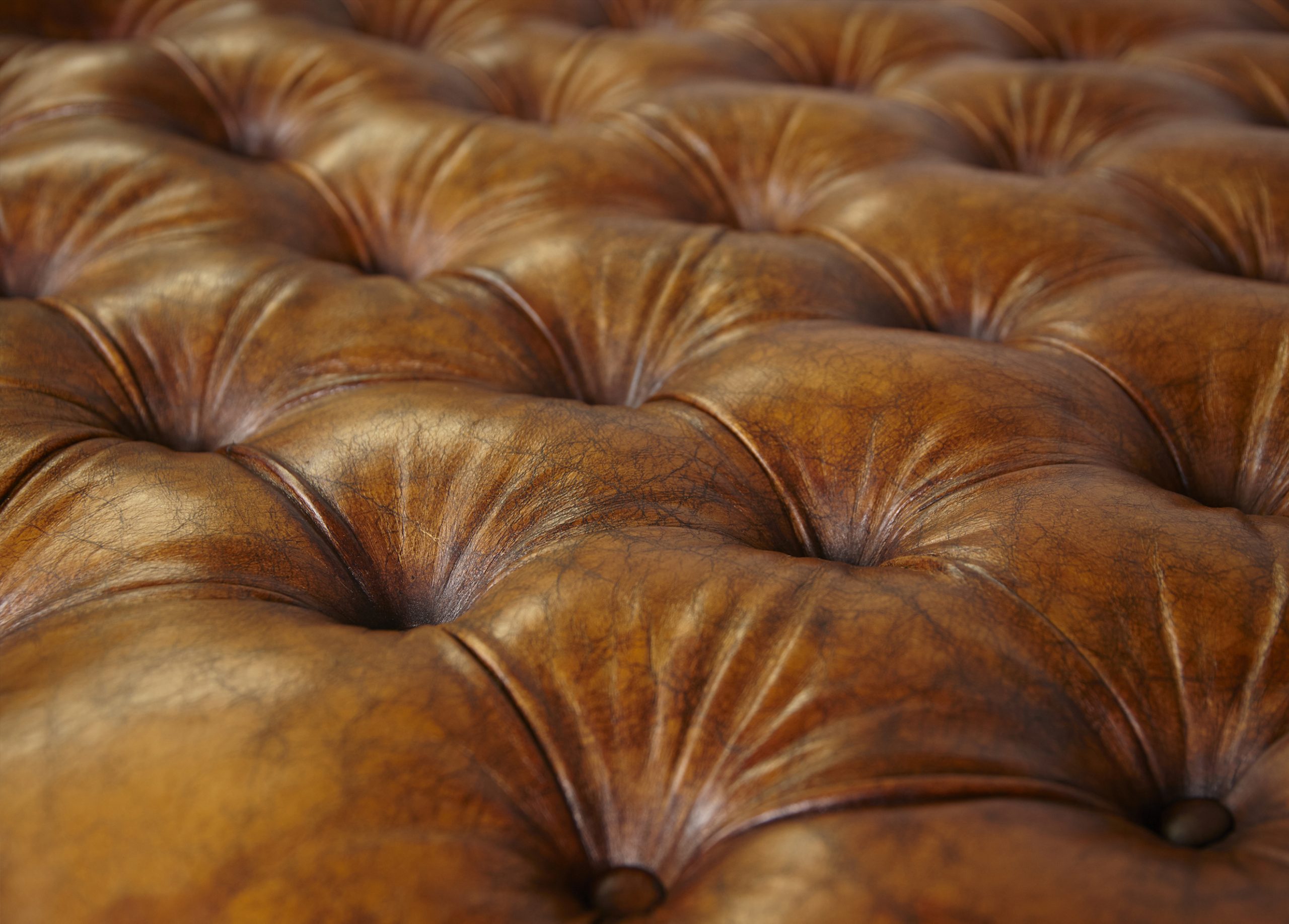Brown leather ottoman